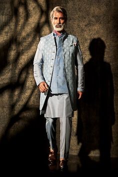 Blue sleeveless sherwani jacket with all over geometric print. - Aza Fashions Fitted Straight Kurta Nehru Jacket For Transitional Seasons, Fitted Straight Kurta Outerwear For Eid, Fitted Blue Outerwear For Designer Wear, Blue Fitted Outerwear For Designer Wear, Sherwani Jacket, Mandarin Collar, Aza Fashion, Geometric Print, Mens Jackets