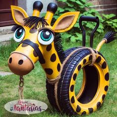 a fake giraffe is sitting in the grass next to a tire with wheels on it