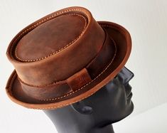 Leather Pork Pie Hat PPH-58 Men's and Women's Headwear - Etsy Classic Brown Hat With Waxed Finish, Classic Leather Fedora With Flat Crown, Classic Flat Brim Hat With Leather Lining, Classic Short Brim Leather Top Hat, Classic Adjustable Hat With Waxed Finish, Winter Leather Fedora With Flat Crown, Classic Leather Top Hat With Short Brim, Classic High Crown Brown Fedora, Classic Brown High Crown Fedora