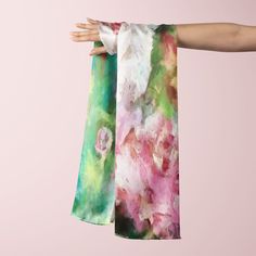 "Elegant shoulder wrap or neck accessory, this is a floral scarf with Pink Peony Flowers Original Art by Claire Bull.   Design is \"Peony Party\" with pink and white Peonies on a soft green background from my original painting. Limited Edition Wearable Art by Claire Bull LONG SCARVES:  10\" x 45\" - almost 1 foot by four feet   (25 cm x 114 cm) 16 x 72\" - almost 1.5 feet by 6 feet (40 cm x 183 cm) Wear any time of year to dress up any outfit, tuck into a blouse or wear as head cover or wrap, keep your hair away or cover up for hair loss  Art is printed on ONE SIDE and shows through 40-80 % depending on fabric Available in : Pure Habotai Silk: 8mm 100% Silk, moderate sheen Smooth and sheer with print showing about 80% on back side Poly Chiffon:  Sheer airy light with moderate sheen. Print Artistic Floral Print Scarves For Spring, Pink Floral Print Scarf For Gift, Pink Floral Print Scarves As Gift, Multicolor Floral Print Scarves For Gifts, Pink Floral Print Scarf As Gift, Multicolor Floral Print Scarves As Gift, Multicolor Floral Scarves As Gifts, Artistic Multicolor Floral Print Scarves, Green Floral Print Scarf For Gift