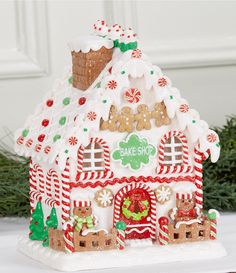 a gingerbread house is decorated for christmas