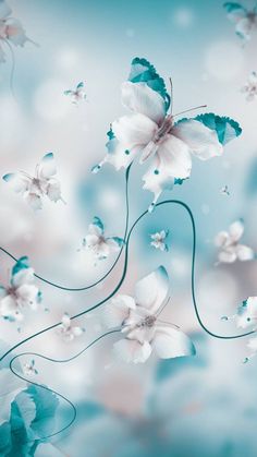 white flowers and blue leaves on a blurry background with watercolor effect in the foreground