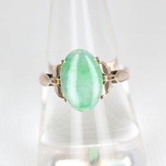 A classic 9 carat yellow gold oval cabochon Jade claw mounted dress ring, with an 9 carat yellow basket under gallery on a solid 9 carat yellow gold band. Jade: 12.5 x 8.4 x 2.0 mm approx   Weight: 2.1 grams Ring Size: M 1/2  - 6 1/4 Condition: Please refer to all images for overall condition. Should you have any questions, please don't hesitate to contact me SHIPPING IN AUSTRALIA If you would like to reduce your shipping costs, please let me know as I can send your items via standard post and i Classic Green Oval Opal Ring, Formal Oval Cabochon Opal Ring, Classic Cabochon Emerald Ring For Formal Occasions, Formal Oval Cabochon Emerald Ring, Formal Emerald Cabochon Ring, Formal Green Oval Signet Ring, Classic Oval Cabochon Opal Ring For Formal Occasions, Classic Oval Hallmarked Opal Ring, Classic Formal Opal Ring Oval Cabochon