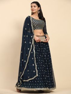 More collection Visit Our Shop  https://fabwindow.etsy.com Customize Stitching : Please Provide Your Complete size. we will stitch your outfit according to your size. Lehenga  👉🏻 Fabric & Work :- Pure Faux Georgette with Sequined Embroidered work.  👉🏻 Length :- 42 Inch. 👉🏻 Waist :- 42 Inch. (Made to Measure) 👉🏻 Inner :- Cotton 👉🏻 Flair :- 4 MTR 👉🏻 Closure :- Chain Attached & With Dori 👉🏻 Stitching Type :- Semi Stitched Blouse (Choli) 👉🏻 Fabric & Work :- Pure Faux Georgette Fabric with Sequined Embroidered Work 👉🏻 Length :- 1 MTR Dupatta 👉🏻 Fabric & Work :- Pure Faux Georgette Fabric With Sequined Embroidered Work 👉🏻 Length :- 2.30 MTR 👉🏻 Color:- Turquoise 👉🏻 Weight :- 1.5 KG WHAT IS SEMI-STITCHED. In a semi-stitched Lehenga set, the Lehenga/ Skirt will come with a Embroidered Lehenga With Traditional Drape For Celebration, Embroidered Lehenga For Celebrations, Anarkali Party Skirt Set With Resham Embroidery, Anarkali Skirt Set For Party With Traditional Drape, Festive Georgette Skirt Set With Dupatta, Anarkali Lehenga For Festival Party, Floor-length Skirt Set With Resham Embroidery For Party, Bollywood Style Party Sets With Zari Work, Bollywood Party Sets With Zari Work