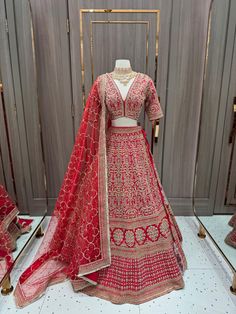 Embrace regal elegance on your special day with our red bridal lehenga BL-018. The mesmerizing zari and cut dana work create a stunning ensemble, radiating opulence and sophistication. Step into the spotlight and feel like a queen as you make lifelong memories in this captivating masterpiece. Fabric: Raw Silk WASH CARE INSTRUCTIONS - Please Dry clean only when it is applicable Ready to Ship! Red Georgette Lehenga With Dabka Detail, Red Shantoon Dupatta With Resham Embroidery, Red Silver Bridal Lehenga, Crimson Red Lehenga, Bright Red Bridal Lehenga, Red Bridal Lehenga, Regal Elegance, Bridal Lehenga Red, Bridal Lehenga