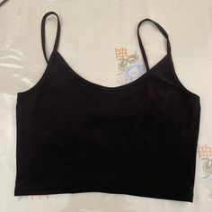 Shein Solid Crop Cami Top Brand New, Never Worn Shein Bag Included Casual Black Crop Top With Built-in Bra, Basic Black Cami Tank Top, Basic Black Crop Top For Everyday, Casual Black Cami Crop Top, Casual Black Camisole Crop Top, Everyday Black Tank Top With Adjustable Straps, Shein Tops, Cropped Cami, Cami Crop Top