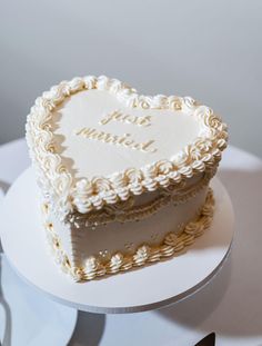 a heart shaped cake sitting on top of a table