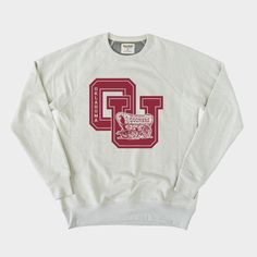 Featuring the classic Sooner Schooner logo with crimson collegiate block lettering, this retro crewneck sweatshirt is perfect for those chilly college football Saturday nights. Pick one up and help cheer OU onto another victory. Boomer Sooner! Sooner Schooner, Ou Softball, Ut Shirts, Oklahoma Softball, Retro Crewneck, School Wishlist, Softball Senior Pictures, Boomer Sooner, College Sweatshirt