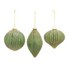 three green christmas ornaments hanging from strings