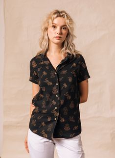 This women's tropical themed collared button-down shirt features a dragons eating noodles, tigers, volcanoes, palm trees, pineapple cocktails and dim sum skull bc of course we would. Whether you're buttoning it to the top or dressing it down with a graphic tee, you'll stay comfy and cool all day long in this super-soft 100% cotton shirt. Features: 100% Comfy & Lightweight Cotton Unique All-Over Print Design Standard Shirt Collar Tortoise Buttons Available in Black Love the Fit? Then please h Pineapple Cocktails, Hipster Food, Eating Noodles, Pineapple Cocktail, Food Shirt, Fleece Sweater, Men Fits, Dim Sum, Sweater And Shorts