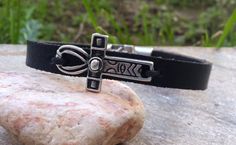 Check out this item in my Etsy shop https://www.etsy.com/listing/218395208/sale-mens-leather-bracelet-silver-ankh Spiritual Silver Leather Bracelet As Gift, Spiritual Cross Bracelets, Handmade Spiritual Leather Bracelet As Gift, Handmade Spiritual Leather Bracelet For Gift, Handmade Black Spiritual Leather Bracelet, Handmade Spiritual Cross Bracelets, Men's Leather Bracelet, Egyptian Ankh, Diy Leather Bracelet