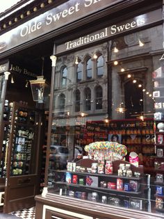 an old sweet shop is shown in the window