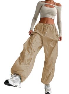 PRICES MAY VARY. FABRIC: Parachute cargo pants made of non-stretch, breathable, wearable, lightweight fabric, comfortable to wear. Cargo pants women baggy are perfect for spring, summer, fall and winter, making you stand out from the crowd, suitable for women/girls/teens. DESIGN FEATURES: Women's parachute pants features low waist, oversized, y2k street style, side cargo pockets to hold your essentials, ruched detailing at the knees, elastic waistband with drawcord, adjustable leg opening with d Korean Clothing Brands, Cargo Pants Women Baggy, Parachute Pants Outfit, Y2k Street Style, Parachute Cargo Pants, Y2k Cargo Pants, Oversized Y2k, Parachute Cargo, Baggy Cargo Pants