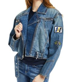 Be your own rockstar with this fashionable denim jacket boasting patches for a well-travelled look. Fashionable zip front 100% cotton Machine wash; tumble dry Edgy Spring Patchwork Outerwear, Denim Biker Jacket With Zipper For Streetwear, Denim Biker Jacket With Zipper Closure For Streetwear, Trendy Denim Biker Jacket With Pockets, Trendy Denim Outerwear With Patches, Trendy Outerwear With Logo Patch For Spring, Trendy Spring Outerwear With Logo Patch, Trendy Patched Denim Jacket, Spring Biker Denim Jacket In Cotton