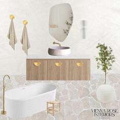 the bathroom is decorated in white and gold with an oval bathtub, round mirror, plant