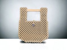 Wood Bead Folding Clutch Handbag Wood Cylinder Handle Dimensions Beaded Beige Shoulder Bag For Shopping, Beige Beaded Shoulder Bag For Daily Use, Beige Beaded Shoulder Bag For Shopping, Beaded Beige Bags For Everyday Use, Beige Beaded Bag For Everyday Use, Everyday Use Beige Beaded Bag, Folding Bag, Wood Wax, Clutch Handbag