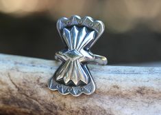 "One large sterling silver concho ring. This sterling silver butterfly concho is fired onto thick 6 gauge sterling silver half round wire and finished with a patina to highlight the gorgeous and bohemian design. - Choose your size at check-out! - Butterfly measures 32 mm by 20mm (1 1/4\" by 6/8\"). - Ring band is 4 mm tall. - Made to Order for your size. Check out the smaller sized concho ring here: https://www.etsy.com/listing/532920133/silver-concho-ring-southwestern-ring?ref=shop_home_active_ Unique Silver Turquoise Concho Ring, Unique Silver Ring With Concho Detail, Rustic Silver Untreated Rings, Rustic Untreated Silver Ring, Ring Butterfly, Boho Design, Statement Ring Silver, Bohemian Design, Silver Butterfly