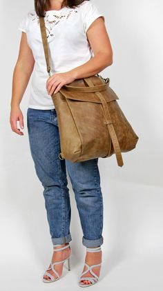 Light Brown Rectangular Hobo Bag For Travel, Light Brown Hobo Bag For Travel, Brown Leather Backpack With Adjustable Strap For On-the-go, Large Capacity Brown Backpack, Camel Satchel Hobo Bag With Adjustable Strap, Light Brown Satchel With Adjustable Strap For Everyday, Camel Shoulder Bag Large Capacity For Travel, Brown Leather Backpack With Large Capacity For On-the-go, Large Capacity Leather Shoulder Backpack For On-the-go