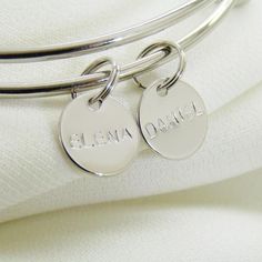 Custom Bracelet With Kids Names//Silver, Rose Gold or 16k Gold Plated//Name Bangle//Mother's Bracelet//Personalized Mom Gift//Teacher Gift// #CustomBracelet #KidsNames #GrandmaBracelet #PersonalizedBangle #PersonalizedMom #TeacherGift #CustomBangle #InitialBracelet #MothersBracelet #CoinBracelet Nickel-free Charm Bracelet For Friendship, Nickel-free Round Charm Bracelet For Friendship, Silver Name Bracelet With Charms, Friendship Sterling Silver Charm Bracelet, Personalized Silver Round Bangle, Silver Round Bangle For Personalized Gifts, Engraved Adjustable Round Charm Bracelet, Adjustable Engraved Round Charm Bracelet, Adjustable Name Bracelet With Charms