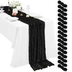 the table is set with white and black linens