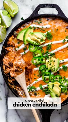 a skillet filled with chicken enchilada and topped with avocado