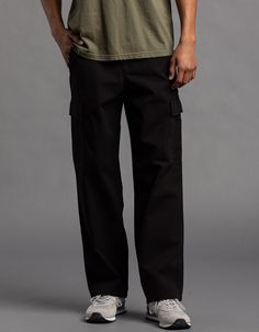 Rsq Loose Cargo Pants. Button Waist Paired With Zipper Fly. Cargo Pockets On Both Legs. Side Slip Pockets. Back Pockets With Button Closure. Approx. Leg Opening: 20". Machine Wash. 100% Cotton. Imported. Black Cotton Pants With Button Closure, Relaxed Fit Wide Leg Cargo Pants With Button Closure, Streetwear Trousers With Button Closure, Straight Cargo Pants For Workwear Without Pockets, Cotton Bottoms With Button Closure For Streetwear, Utility Full Length Pants With Button Closure, Black Cotton Bottoms With Button Closure, Casual Full-length Work Pants With Belt Loops, Relaxed Fit Work Pants With Belt Loops