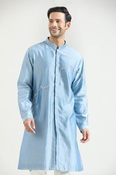 Powder blue chanderi kurta with placed abstract pattern embroidery. Comes with contrasting pyjama. - Aza Fashions Blue Sherwani With Gota Work, Designer Blue Sherwani With Gota Work, Blue Sherwani With Gota Work For Eid, Ceremonial Blue Kurta With Cutdana, Blue Cutdana Kurta For Ceremonial Occasions, Kurta Set Men, Kurta Set For Men, Men Kurta, Pattern Embroidery