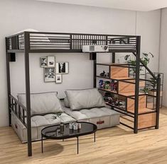 a loft bed with a couch underneath it in a living room next to a coffee table