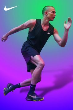 a man in black shirt and shorts playing with a frisbee on purple and green background