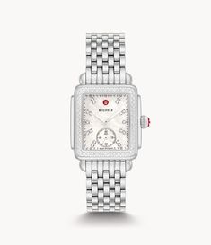 Inspired by the geometric shapes of Art Deco architecture, this stainless Deco Mid shines with 126 hand-set diamonds (0.57 carat weight) on the bezel and white mother-of-pearl dial adorned with double diamond hour markings. The signature MICHELE crown accents this stunning timepiece with a Swiss movement and the iconic seven-link stainless steel bracelet is interchangeable with any 16mm MICHELE strap. White Jewelry Watch With Diamond Hour Markers, Timeless White Diamond Watch With Chronograph, Classic White Diamond Analog Watch, Luxury White Chronograph Jewelry And Watches, Timeless White Diamond Watch With Metal Dial, White Analog Diamond Watch For Formal Occasions, White Analog Diamond Watch For Formal Events, Formal White Diamond Analog Watch, Formal White Analog Diamond Watch