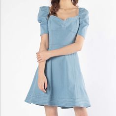 Fabric Content: 68% Cotton 30% Polyester 2% Spandex Description: L: 33" B: 34" W: 28" Runs Slightly Large Model Wears A Size Small. + Height: 5'3'' + Bust: 30'' + Waist: 24'' + Hip: 30'' Blue Puff Sleeve Denim Dress For Spring, Blue Denim Puff Sleeve Dress For Spring, Fitted Spring Denim Dress With Sweetheart Neckline, Spring Cotton Denim Dress With Puff Sleeves, Chic Cotton Denim Dress With Puff Sleeves, Spring Cotton Denim Puff Sleeve Dress, Casual Cotton Mini Dress With Sweetheart Neckline, Fitted Cotton Denim Dress With Puff Sleeves, Denim Blue Cotton Denim Dress With Puff Sleeves