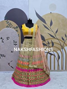 Lehnga Fabric :- Net With Silk Dupatta Fabric :- Heavy Butterfly Net With Work With Fancy Border 9 mm Work (dupatta size 2.40 meter) Blouse Fabric :- Malay satin silk Lehenga Inner :- Micro Silk Colour :- Multicolour Blouse Work :- Multi needle Work, Sequence 9mm Work, Embroidery Work, Zari Work. Lehenga Work :-Multi needle Work, Sequence 9mm Work, Embroidery Work, Moti Pari Work, Zari Work . Type : Lehenga :-Semi Stitched, Blouse:-UN stitched OCCASIONS :-Festival, Party Lehenga choli , Traditio Multicolor Choli With Resham Embroidery For Diwali, Multicolor Embroidered Art Silk Lehenga, Multicolor Resham Embroidered Choli For Diwali, Anarkali Embroidered Multicolor Lehenga, Semi-stitched Embroidered Multicolor Lehenga, Semi-stitched Choli With Multicolor And Resham Embroidery, Semi-stitched Yellow Embroidered Choli, Bollywood Style Embroidered Multicolor Sharara, Multicolor Gota Work Embroidered Fabric