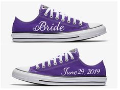 two purple converse shoes with the bride and groom on them