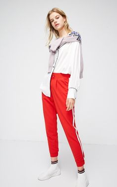 Length: Full Length Material: Polyester Material: Spandex Model Number: 119150501 Pattern Type: Solid Style: Casual Pant Style: Pencil Pants Closure Type: Drawstring Front Style: Flat Waist Type: Mid Gender: Women Fit Type: Loose Decoration: None Applicable age: The age of 18 to 24 High female trousers: Natural waist Item no: 119150501 Year season: Spring 2019 Thickness: Routine Unique Design: Contrasting printed creases, Elasticized cuffs, Buckle & zip fly Sporty Elastane Pants For Spring, Sporty Elastane Pants For Summer, Red Stretch Sweatpants For Spring, Spring Stretch Elastane Sweatpants, Spring Leggings With Elastic Waistband, Casual Pants Style, Casual Pant, Pencil Pants, Loose Pants