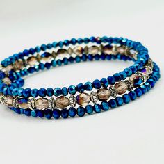 This Beaded Blue Bracelet Is Truly Dazzling, Filled With Gorgeous Two-Toned Czech Fire Polished Glass Beads, Crystals, And Silver Spacer Beads Between Them And Will Wrap Around Your Wrist 3 Times. Blue Cuff Bracelet, Bracelets Diy, Bracelet Crystal, Beaded Crafts, Jewelry Beaded, Jewelry Blue, Crystal Beads Bracelet, Beaded Bracelets Diy, Blue Bracelet