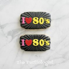 two cookies with the words i love 80's on them