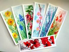 five watercolor cards with flowers on them