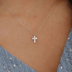 Our classic prong-set diamond cross is timeless and perfect as a defining symbol of your faith. This necklace is opulent enough to make a statement while not being ostentatious. Pair this with any of the devotional pieces in our Religious Collection. Natural Diamonds: 0.15ctw 18K White or Yellow Gold Length: 18 Inches Mavilo Exclusive Diamond Cross Pendant In Diamond White, Cross-shaped Diamond Necklace With Single Cut Diamonds, White Diamond Spiritual Necklace, White Diamond Spiritual Necklaces, Diamond White Diamond Pendant Cross Necklace, Diamond White Brilliant Cut Cross Pendant Necklace, Elegant Diamond White Cross Jewelry, White Gold Crucifix Jewelry With Diamond Accents, White Gold Crucifix With Diamond Accents