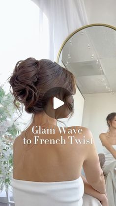 a woman sitting in front of a mirror with the words glam wave to french twist