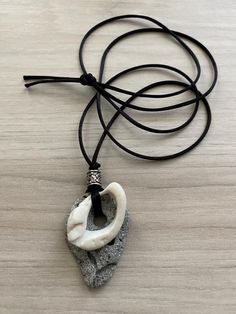 Hag stones are said to have many uses. Protection, Meditation, Astral Travel, Cleansing Rituals, Divination, Connection with the spiritual realm or with ancestors who have passed on, just to name a few.   Hag Stone Necklace with Seashell, Holey Stone Pendant, Odin Stone, Protection Stone, Faerie Stone, Pagan Stone, Witch Stone, Adder Stone The necklace pictured is the one you will receive. Hag stone with necklace measures 33" including stone, on a Black satin rattail cord. Seashell from Revere Beach. Silver-plated Celtic bead.  Original design 2024 BACK TO MY SHOP: https://www.etsy.com/shop/SeaByTheShore Use coupon code FREESHIP75 to receive free shipping on all orders over $75.00. Hag Stone Necklace, Revere Beach, Cleansing Rituals, Hag Stones, Astral Travel, Seashell Necklace, Protection Stones, Stone Pendant, Stone Necklace