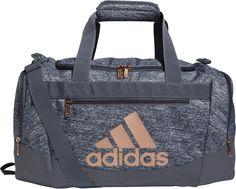 Keep your options open with this adidas duffel bag. Ready for whatever workout your trainer throws at you, this small-size bag lets you easily pack up your gear thanks to a roomy main compartment and zip pockets at the ends. A pad on the carry strap keeps things comfortable even when your bag feels heavy. Fit & Design: Dimensions: 20.5" x 11" x 11.75" Volume: 44.5 L Durable fabric Front zip pocket and end zip pockets Adjustable detachable shoulder strap with movable pad Dual carry handles with p Small Duffle Bag, Adidas Bags, Easy Packing, Grey Adidas, Adidas Online, Sport Bag, Duffel Bag, Small Bags, Backpack Bags