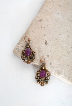 60s chandelier earrings | Vintage 1960s ornate gold tone purple drop earrings by CALIVINTAGEUSA on Etsy Purple Vintage Jewelry, Purple Vintage Jewelry With Intricate Design, Vintage Purple Earrings For Party, Vintage 14k Gold Purple Jewelry, Vintage Purple Earrings, Ornate Earrings, 60s Chandelier, Vintage Purple Teardrop Earrings, Ornate Purple Drop Earrings