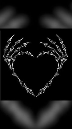 a heart made out of small white dots on a black background with the word love written in it