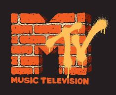 the letter m is painted on a brick wall with orange spray paint and it says music television