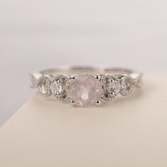 All HANDMADE ITEMS SHIP IN APPROX 8 DAYS Main Stone: Genuine natural pink quartz Main Stone Size: round cut 6 mm x 6mm Main Stone Weight: 0.86 carat Side Stone: CZs Height From The Ring Setting Bottom(to gemstone top): about 5.81 mm Width of Ring band Measure: gradually varied,about 1.79 to 4.89 mm Material: .925 Sterling Silver/14K White Gold/14K Yellow Gold/14k Rose Gold Engraved: Available For FreeNo more than 13 letters) Customized:Of course! Tell me what you want Includes With Order: All of Pink Crystal Ring With Prong Setting, Pink Sterling Silver Crystal Ring, Round Rose Quartz Promise Ring, Pink Round Cut Crystal Ring With Accent Stones, Pink Crystal Ring With Accent Stones, Round Cut, Pink Circular Crystal Promise Ring, Pink Solitaire Crystal Ring For Wedding, Rose Quartz Crystal Promise Ring, Pink Rose Quartz Rings For Anniversary