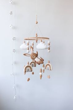 a baby mobile is hanging from the ceiling