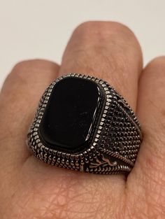 One of a kind piece in size 10. Fine details worked into the stainless steel casting. gorgeous cut of black onyx Steel rings can not be re sized. All jewelry is shipped in a nice gift box. Check out our over a THOUSAND great reviews Engraving is $4 per letter and is not always perfect depending on the piece. It can take a few days if the jeweler is busy. This is payable to Paypal Judithsltd@gmail.com Sterling Silver Signet Ring With Black Enamel As Gift, Modern Onyx Signet Ring For Gift, Modern Onyx Signet Ring Gift, Engraved Onyx Jewelry As Gift, Black Onyx Jewelry For Formal Occasions, Elegant Black Stainless Steel Rings, Engraved Onyx Jewelry For Gifts, Formal Black Onyx Jewelry, Engraved Black Rings For Gift