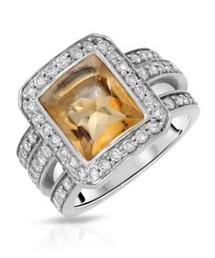 ITEM INFORMATION Collection Glamour Product Type Ring Condition New Gender Women's Total Item Weight 11.5 grams (approx.) Total Carat Weight 4.11ctw (approx.) Product Dimensions W 13.00mm x H 5.50mm MATERIAL INFORMATION Material Type(s) 14k White Gold PRIMARY GEMSTONE INFO Gemstone Honey Citrine / 1 pcs Composition Natural Total Carat Weight Approx. 3.03ct Shape and Cut Freeform Special Cut Color Grade Yellow Setting Type Bezel SECONDARY GEMSTONE INFO Gemstone Diamond / 68 pcs Total Carat Weight Luxury White Gold Citrine Diamond Ring, Natural Honey, November Birthstone, Color Grading, Cocktail Ring, Cut And Color, Cocktail Rings, Citrine, Gold Diamond