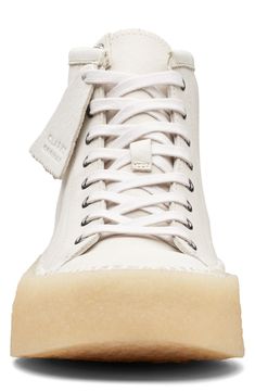 A 70s-inspired aesthetic defines a sharp street sneaker built from supple leather and set on a durable rubber cupsole. Leather upper/EVA lining and sole Imported White High-top Sneakers For Streetwear With Stitched Sole, White High-top Sneakers With Stitched Sole, Canvas High-top Sneakers With Textured Sole For Streetwear, High-top Sneakers With Rubber Sole, High-top Canvas Sneakers With Textured Sole, Canvas Sneakers With Stitched White Sole, Leather Skate Shoes With Gum Sole, White Sole High-top Sneakers With Plain Toe, Mid-top Leather Sneakers With Vulcanized Sole