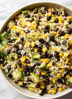 a bowl filled with rice and black beans